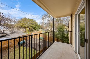 A balcony with a black railing